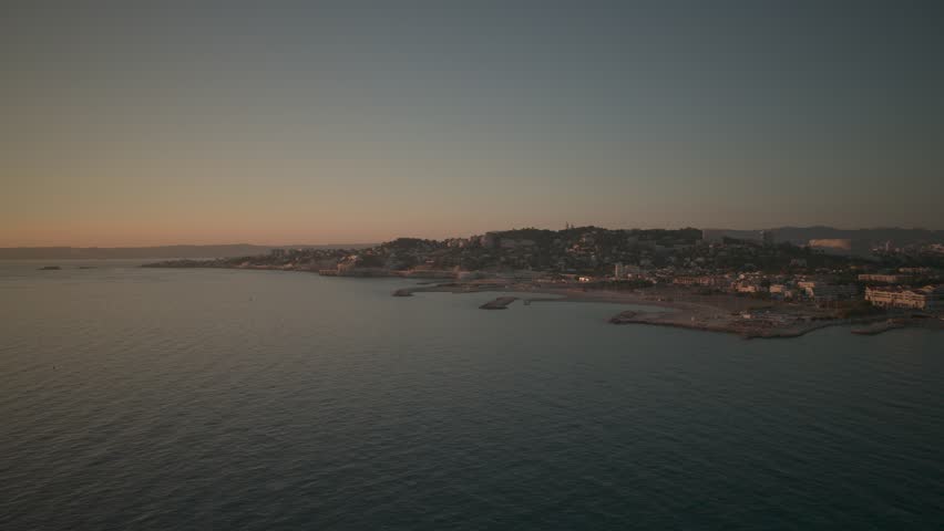 Aerial view of Marseille in Sunset
Beautiful drone shot of Marseille in sunset alongside the sea and beach