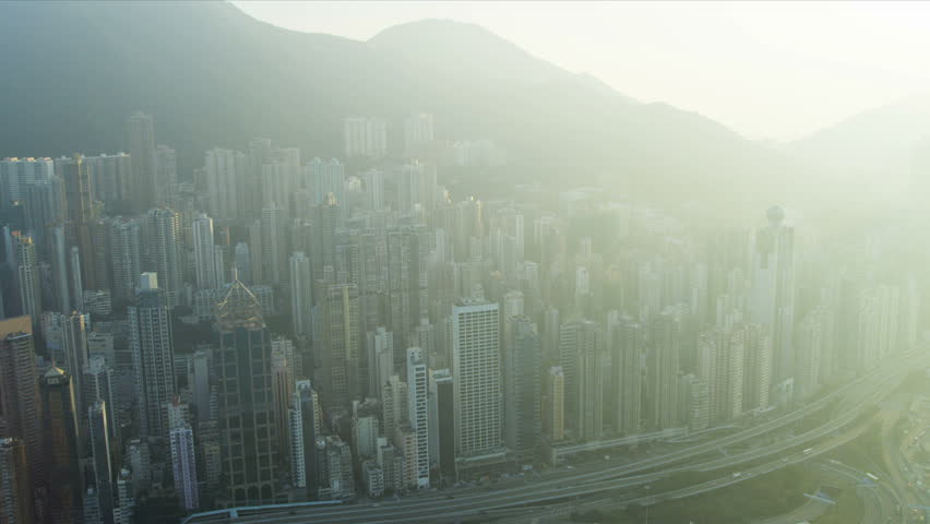 Aerial view of causeway highway and Hong Kong city skyscrapers, Victoria Harbour,  | Shutterstock HD Video #3738860