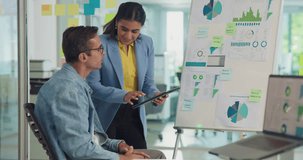 Analytics, collaboration and tablet with business people in office together for social media development. Data, infographic or illustration with man and woman employee at work for review or solution - Powered by Shutterstock - Get 15% off with code: PIKWIZARD15