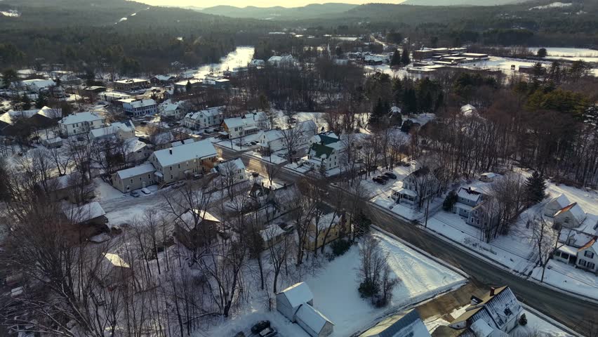 Fly with me above the Conway New Hampshire city shape during winter time and see the famous covered bridges 