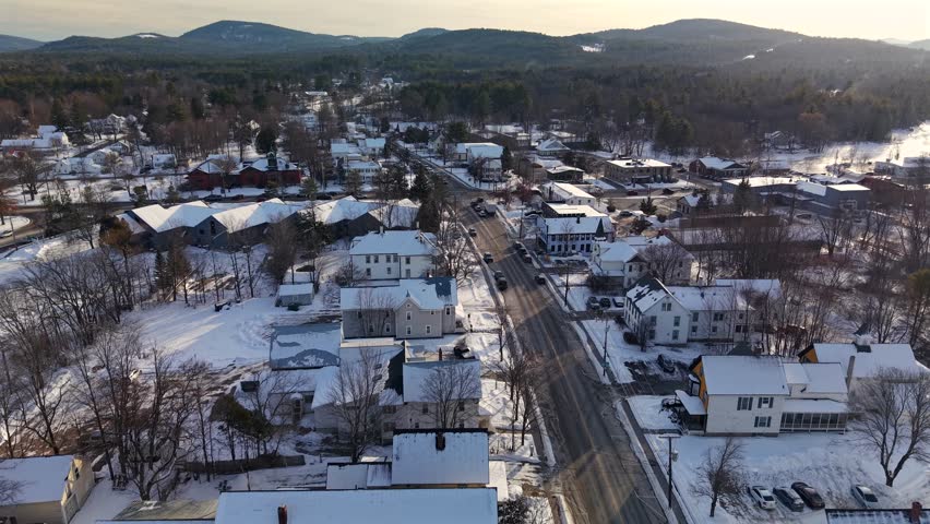 Fly with me above the Conway New Hampshire city shape during winter time and see the famous covered bridges 