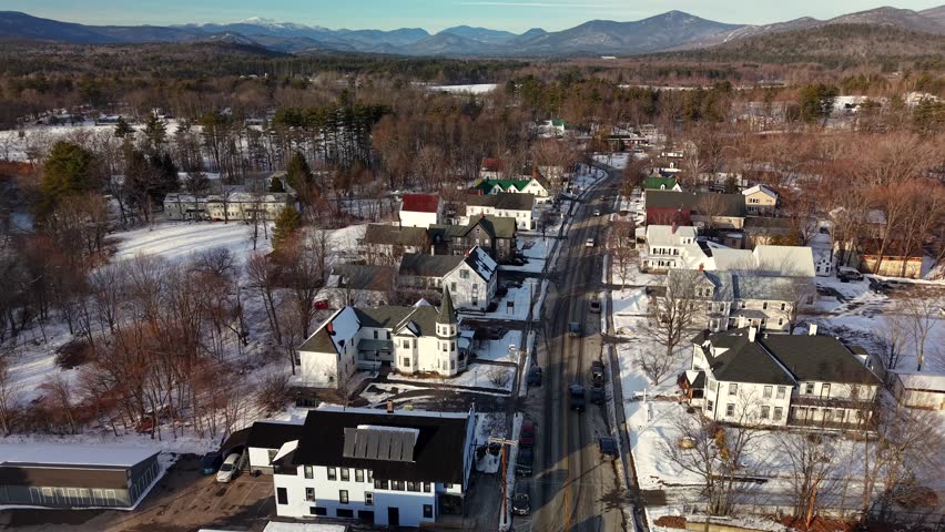 Fly with me above the Conway New Hampshire city shape during winter time and see the famous covered bridges 