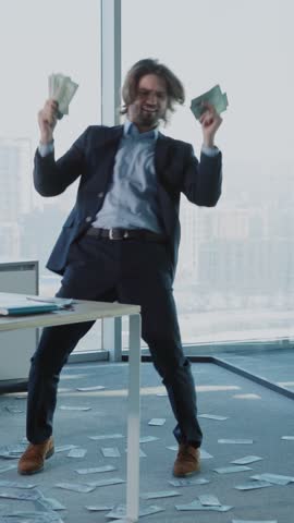 A welldressed man joyfully dances with money, showcasing success