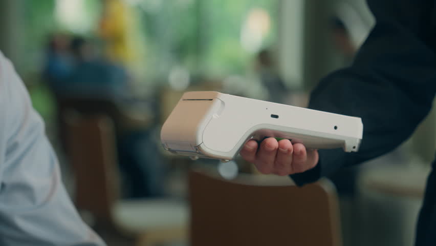 Contactless payment visitor customer business client buyer cafe man guy male businessman pay phone NFC smartphone purchase online bank credit card scan wifi technology terminal waiter serving cashless