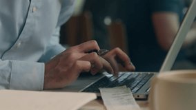 Multitasking businessman Indian Arabian man male entrepreneur freelancer in cafe stress overwork tired business guy typing laptop online talk mobile phone chatting pay bills manage tasks problem write - Powered by Shutterstock - Get 15% off with code: PIKWIZARD15