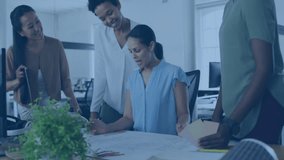 Collaborating in office, diverse team working with digital animation overlay. Teamwork, collaboration, business, creativity, brainstorming, co-working - Powered by Shutterstock - Get 15% off with code: PIKWIZARD15