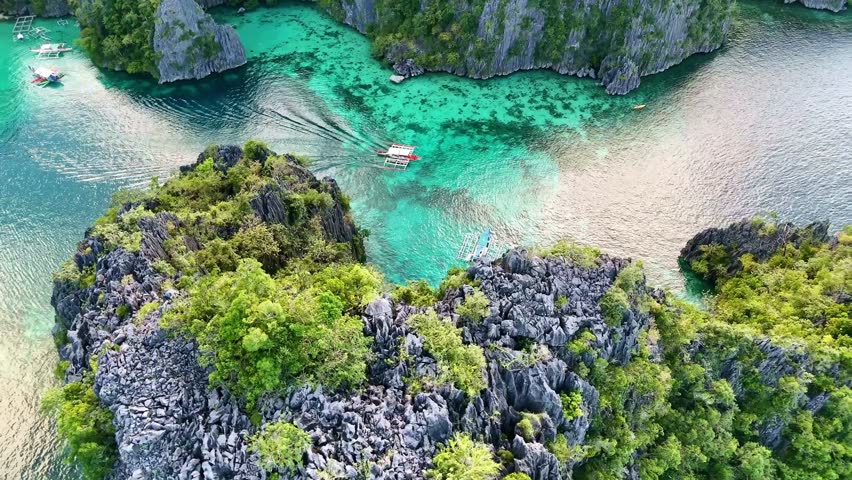 Turquoise Twin lagoon, Kayangan Lake limestone cliffs in Philippines. tourism destination Coron, Palawan. 