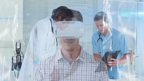 Using virtual reality headset, man in school while medical professionals discuss records. Technology, healthcare, education, collaboration, discussion, innovation - Powered by Shutterstock - Get 15% off with code: PIKWIZARD15