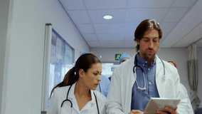 In hospital, doctors reviewing tablet data with animation of digital connections. Healthcare, technology, innovation, future, medicine, analysis - Powered by Shutterstock - Get 15% off with code: PIKWIZARD15