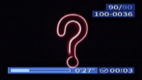 A red neon question mark illuminated against a black background, featured in a dynamic video abstract animation. - Powered by Shutterstock - Get 15% off with code: PIKWIZARD15