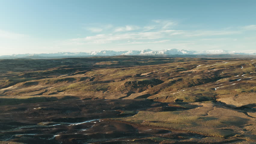 Sunny view over Iceland mountains, wide drone shot