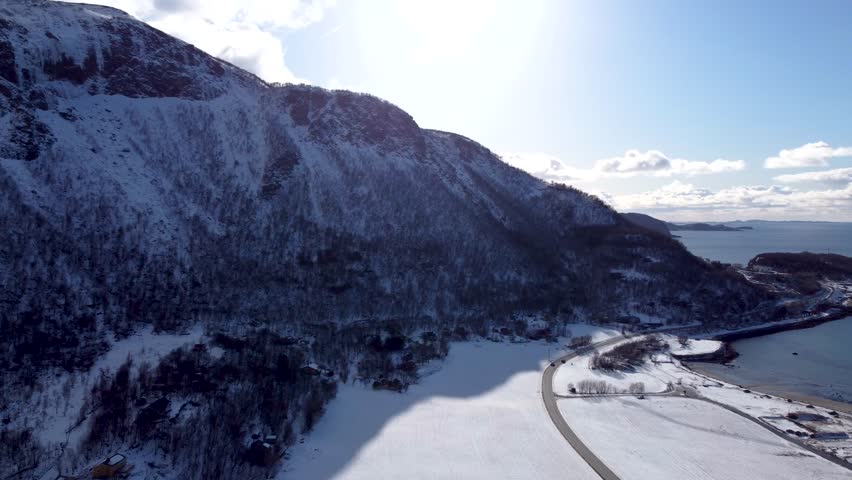 Witness the breathtaking winter landscapes of Northern Norway in this 4K drone footage. Snow-covered mountains, icy fjords, and Bodø’s serene beauty are on full display
