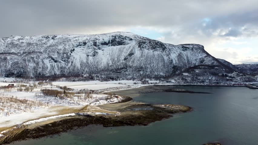 This 4K drone footage highlights the winter beauty of Bodø, Norway. Snowy mountains, icy fjords, and serene Arctic landscapes are perfect for any project.