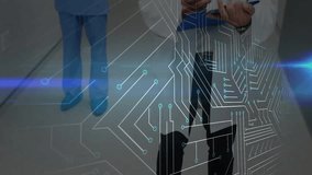 In hospital hallway, doctors walking with digital circuit overlay animation visible. Healthcare, technology, innovation, medical, teamwork - Powered by Shutterstock - Get 15% off with code: PIKWIZARD15
