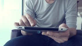 A person using a tablet device, surrounded by digital icons representing cloud storage, Wi-Fi, and messaging. This image highlights the integration of technology in modern lifestyle and communication. - Powered by Shutterstock - Get 15% off with code: PIKWIZARD15