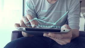 A person using a tablet, interacting with an interface displaying digital graphs and analytics. This image captures the essence of technology and data analysis in a modern, digital workspace. - Powered by Shutterstock - Get 15% off with code: PIKWIZARD15