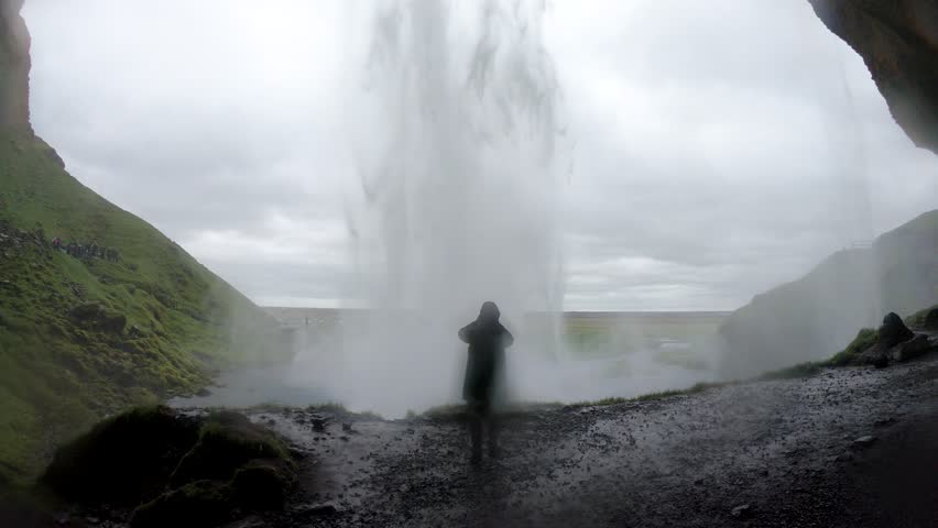  Seljalandsfoss waterfall in cloudy weather, Iceland, wet camera from water droplets