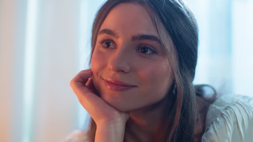 Retro date of a young couple. They sit at the table and drink wine, talk and joke. There are seafood on the table. 
They dance and watch the sunset. A beautiful young girl with a bouquet of roses. Ret