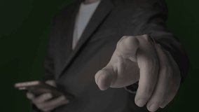 Businessman interacting with cutting-edge digital interface with transparent holographic display, breaking through phone screen, data grid, demonstrating high-tech system analysis on black background. - Powered by Shutterstock - Get 15% off with code: PIKWIZARD15