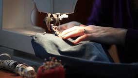 Sewing machine with female hands close-up.  - Powered by Shutterstock - Get 15% off with code: PIKWIZARD15
