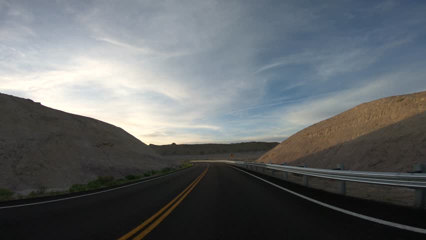 Front Facing Driving Plate Into Sunset. American Utah Highway. Drive Arches National Park Desert Action Camera