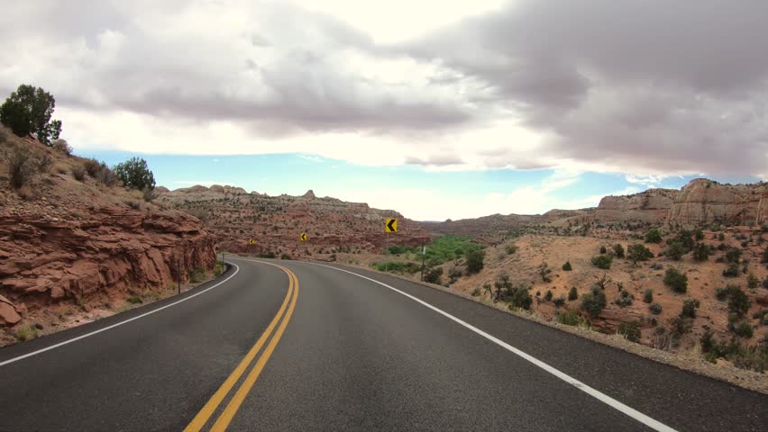 Driving Plate Front Facing American Utah West Highway. Drive to Capitol Reef National Park Desert