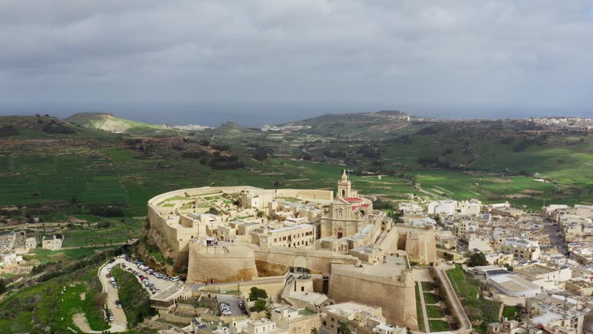 Aerial shot closing in to Catherdral of the Assumption in Gozo, Malta