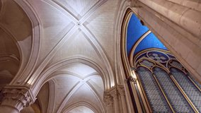 Details of interior of Notre-Dame de Paris after reconstruction. Low-angle pov - Powered by Shutterstock - Get 15% off with code: PIKWIZARD15