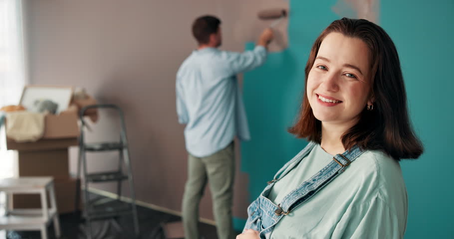 Painting, face and pregnant woman with couple in baby room for interior design, color choice or wall decor. Home improvement, pregnancy and support with man in apartment for nursery and renovation