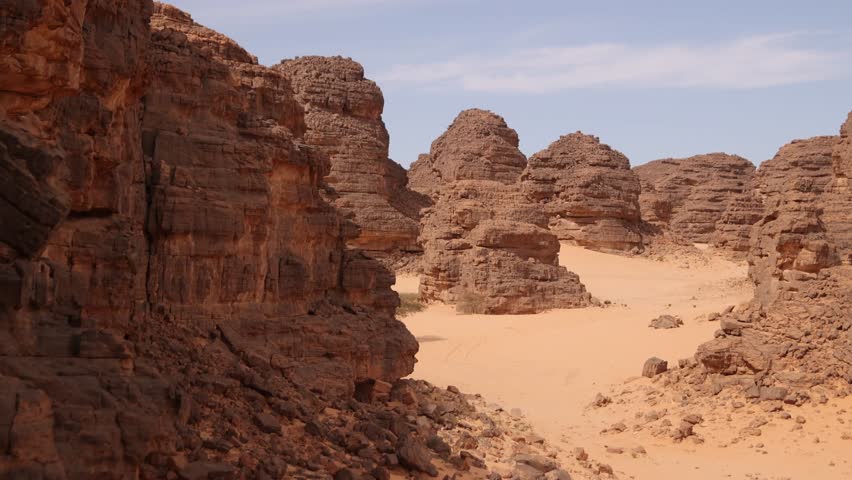 aerial panoramic view of stunning desert landscape panoramic view of sand dunes and rock formation in Tadrart Rouge, Tassili N