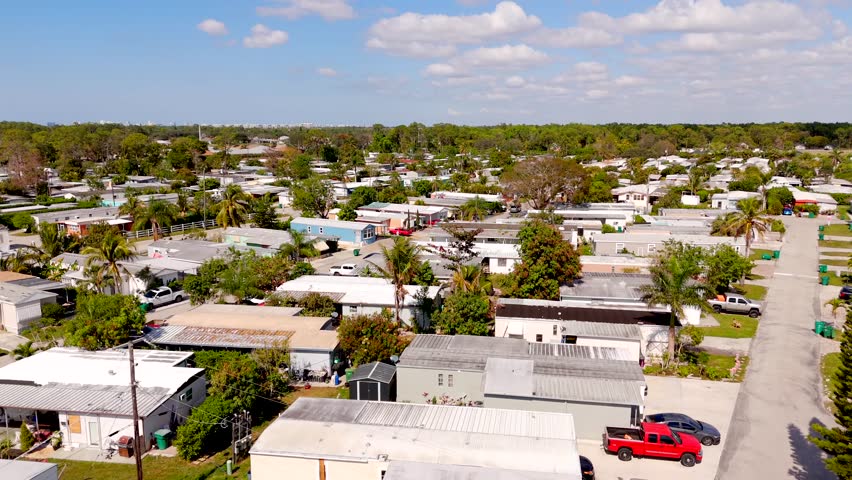 Aerial video mobile home park trailer homes in Naples Florida 2025