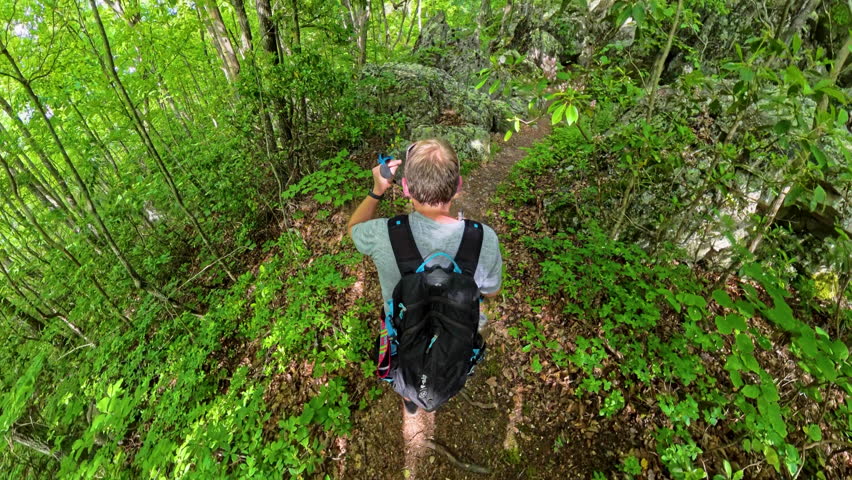 Man Hikes on Trail Through Rocks for Shenandoah National Park