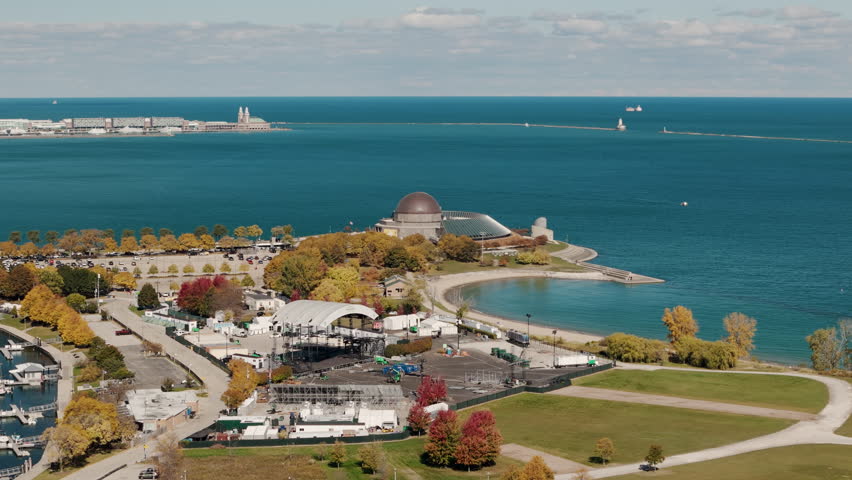 The element of a modern city Chicago. The scene is from coast, lake side toward Michigan lake with calm blue waters. Autumn season