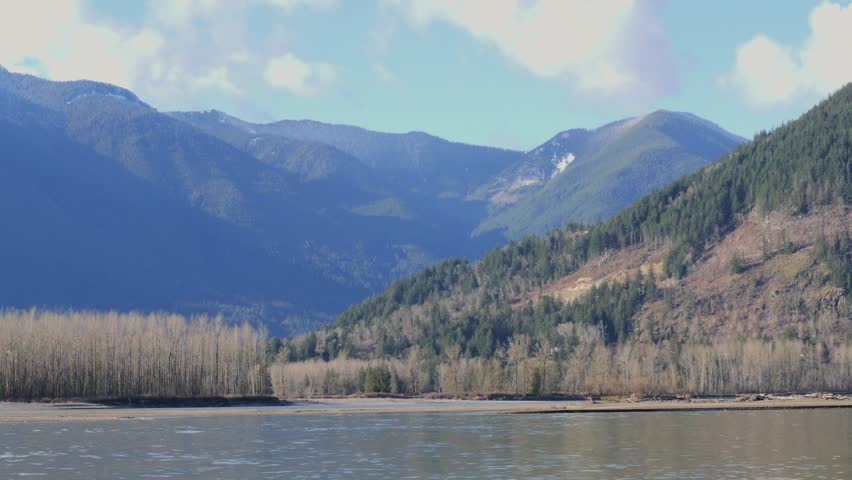 Beautiful view of the Fraser River at Island 22 Regional Park during a winter season in Chilliwack, British Columbia, Canada
