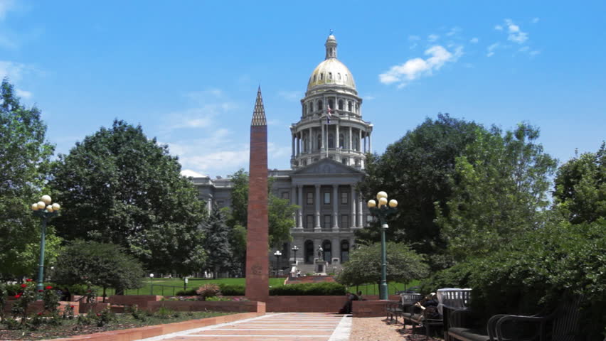 Colorado's Capitol building with monument in foreground, Denver, CO.