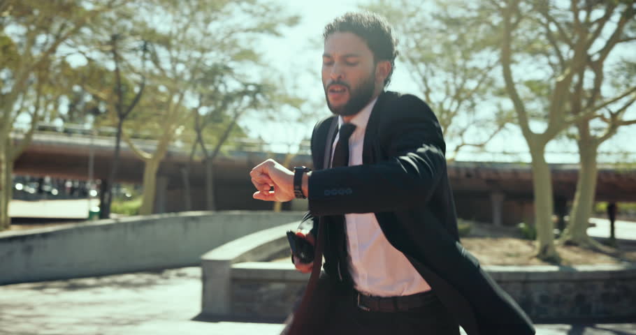 Running, employee and man with watch, late and checking time for business meeting, outdoor and stress. Commuting, chaos and rushing to work in morning, travel and person with smartphone for schedule