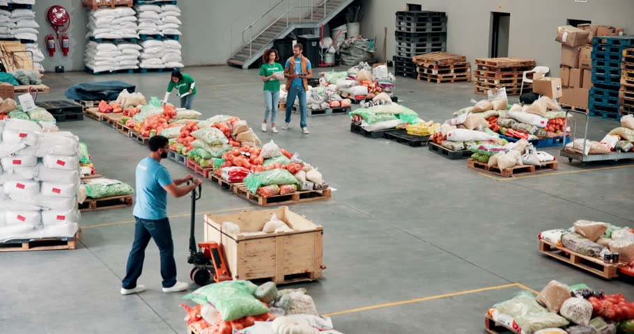 People, help and food distribution at warehouse, community charity and humanitarian crisis. Volunteering, staff and machine with groceries for courier services, homeless donation and parcel logistics