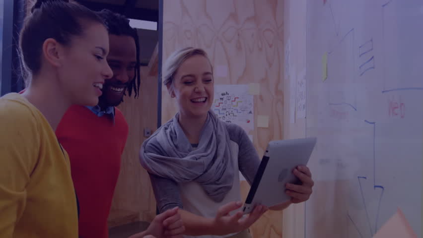 In school, team collaborating on animation with digital graphs on tablet. Collaboration, teamwork, digital technology, creativity, education, innovation - Powered by Shutterstock - Get 15% off with code: PIKWIZARD15