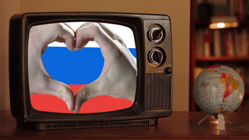 Hands Forming a Heart Shape Over the Russian Flag on a Retro TV With a Spinning Globe - 4K - Powered by Shutterstock - Get 15% off with code: PIKWIZARD15