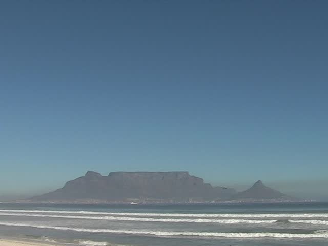 Famous Table Mountain in Cape Town, a landmark in South Africa, on a windless and polluted day