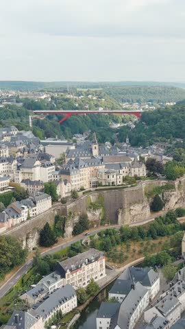 Vertical video. Luxembourg City, Luxembourg. Bock Casemates. Panoramic view of the historical part of Luxembourg city. The city is located in a deep valley of two rivers - Alzette and Petrus, Aerial