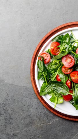 A high-quality 4K vegan food promo featuring a fresh and organic salad. Perfect for healthy lifestyle ads, plant-based diet promotions, and restaurant menus highlighting nutritious meals.