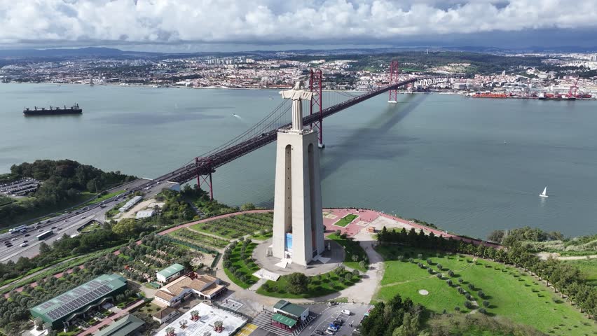King Christ At Almada In District Of Lisbon Portugal. Christ The King Sanctuary. Tourism Landmark. King Christ At Almada In Portugal. 25Th April Bridge Scenery. Postcard Landscape. Lisbon Skyline.