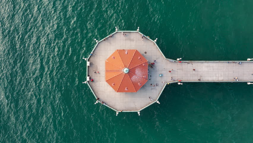 Top View Of Roundhouse Aquarium At Manhattan Beach Pier In Manhattan Beach, California. aerial shot, timelapse