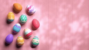 Looping video of painted easter eggs on a wooden pink table animated in stop motion style. Happy Easter video background template in pastel colors and copy space 3D animation - Powered by Shutterstock - Get 15% off with code: PIKWIZARD15