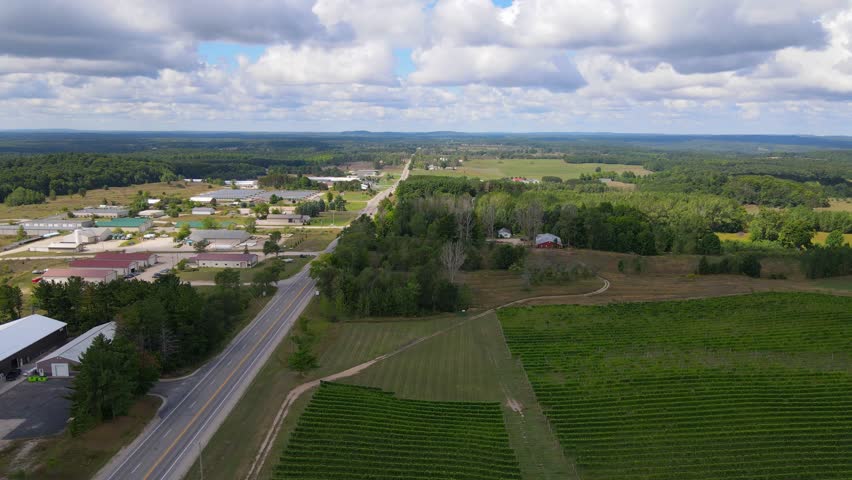Countryside town and endless landscape of Michigan, aerial view