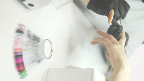 Vertical Video, Classic Nail Manicure In Beauty Salon, In the Foreground Blurry Palette - Powered by Shutterstock - Get 15% off with code: PIKWIZARD15