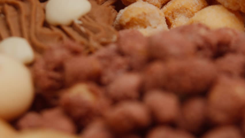 4k Macro Close-up of tray of butter cookies with guava paste and petit-four with motion