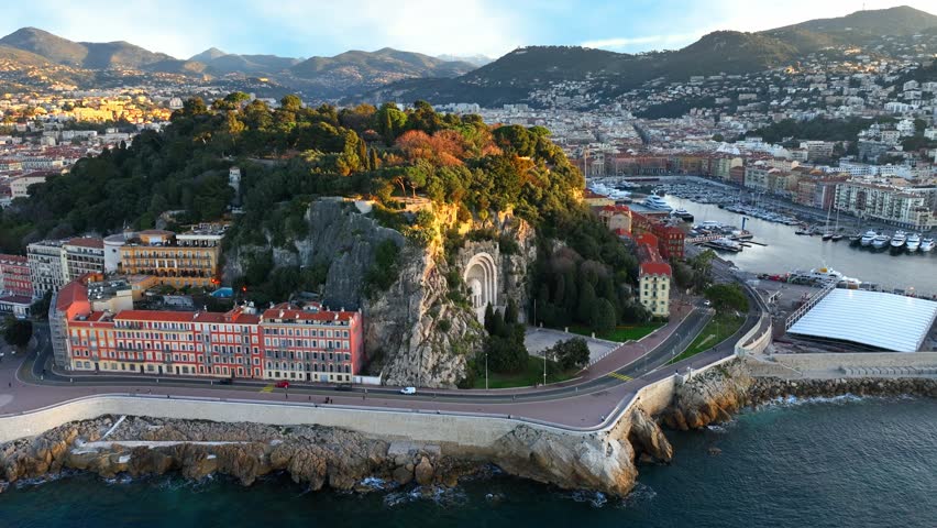 French town of Nice, luxury resort on French Riviera, Cote d Azur tourism, south of France, drone view of Nice castle and port of Nice. High quality 4k footage