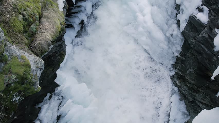 Winter Waterfall – Partially Frozen Stream in Norwegian Mountains
